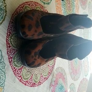 Ankle strap leopard wedge.